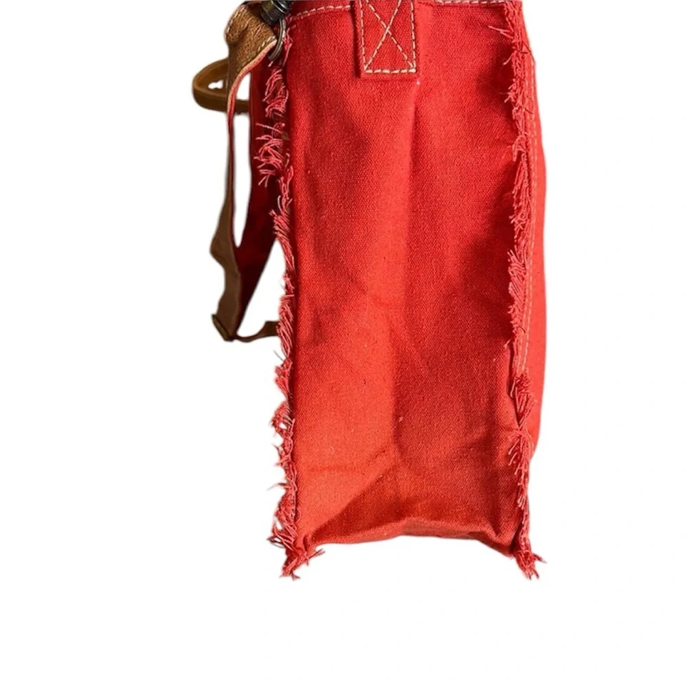 A La Fontaine Des Parfums Red & Black Fringe Tote. Shoulder & Crossbody Straps